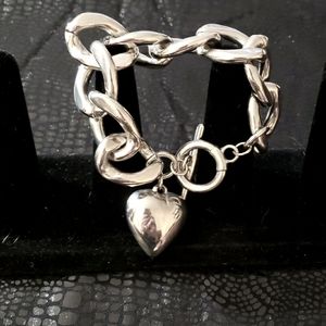Silver tone chain link bracelet with heart charm